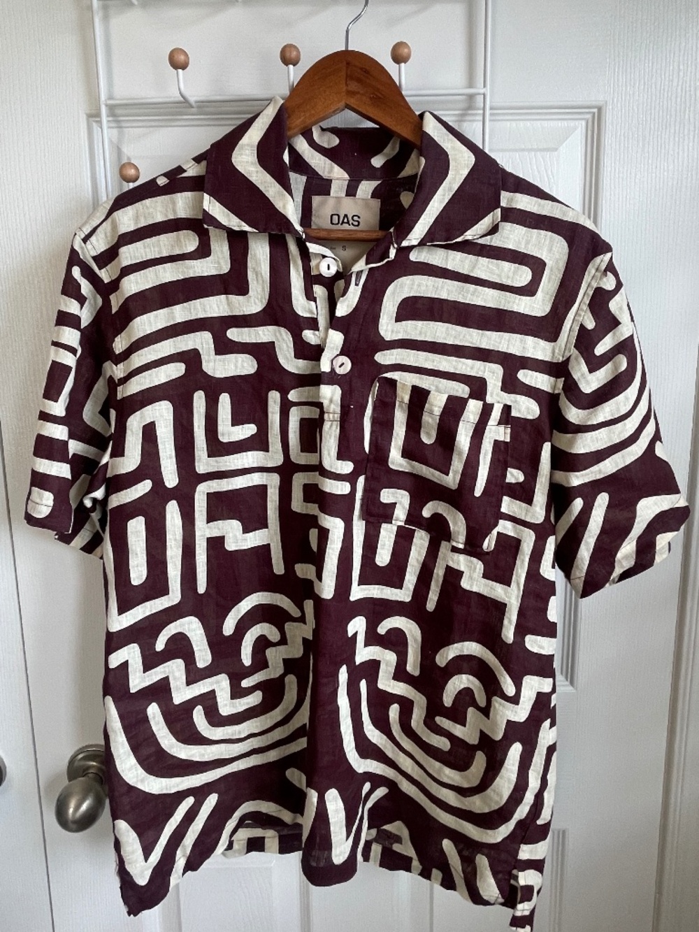 Brown linen shirt with abstract pattern